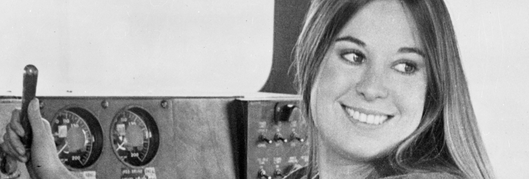 Female train conductor 12903 P1 935 1701 Black and white photo of 1970s train conductor